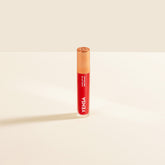 YENSA Luxe Lip Nourishing Oil with hyaluronic and vitamin E, glossy lip oil in a sleek bottle with a vibrant rising ruby color