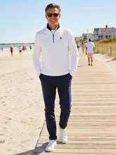 White Water Life Montauk quarter zip midweight comfort shirt with white boardwalk background, showcasing the stylish outerwear.