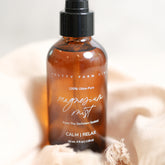 Pretty Farm Girl magnesium mist body spray toner with lavender and aloe vera for soothing skin, shown in a spray bottle.