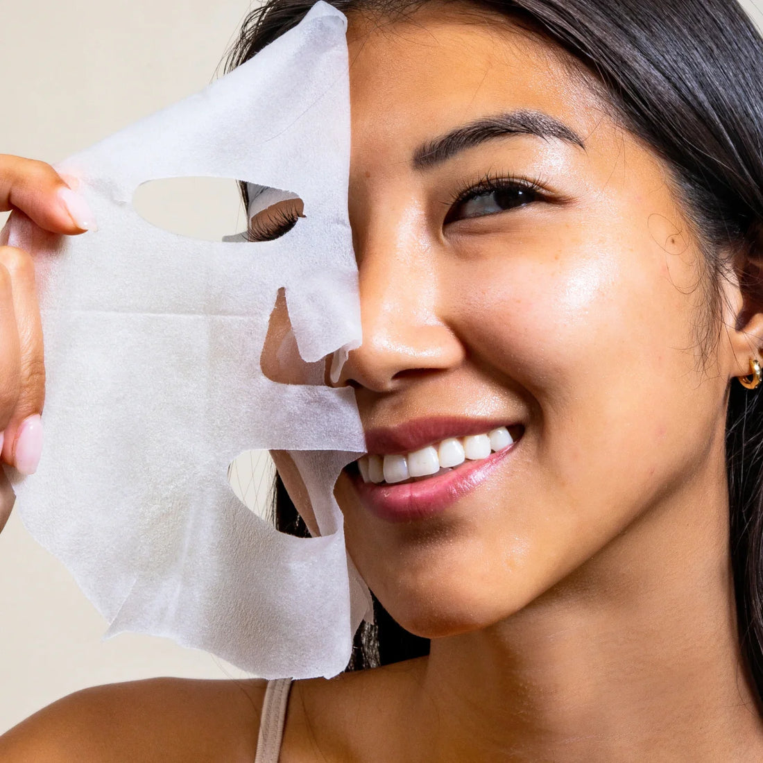 Solawave hydrating sheet mask for skincare, showing the sheet mask soaked in serum with a refreshing design on the package