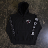 Black Mantra Pullover Hoodie by Any Means Necessary Clothing, front view showing the hood and logo design.
