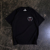 Black Mantra T-Shirt from Any Means Necessary Clothing, front view showing bold statement design on soft cotton shirt.