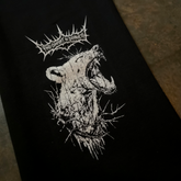 Close-up of black Mantra sweatpants by Any Means Necessary Clothing showing the soft fabric and relaxed fit.