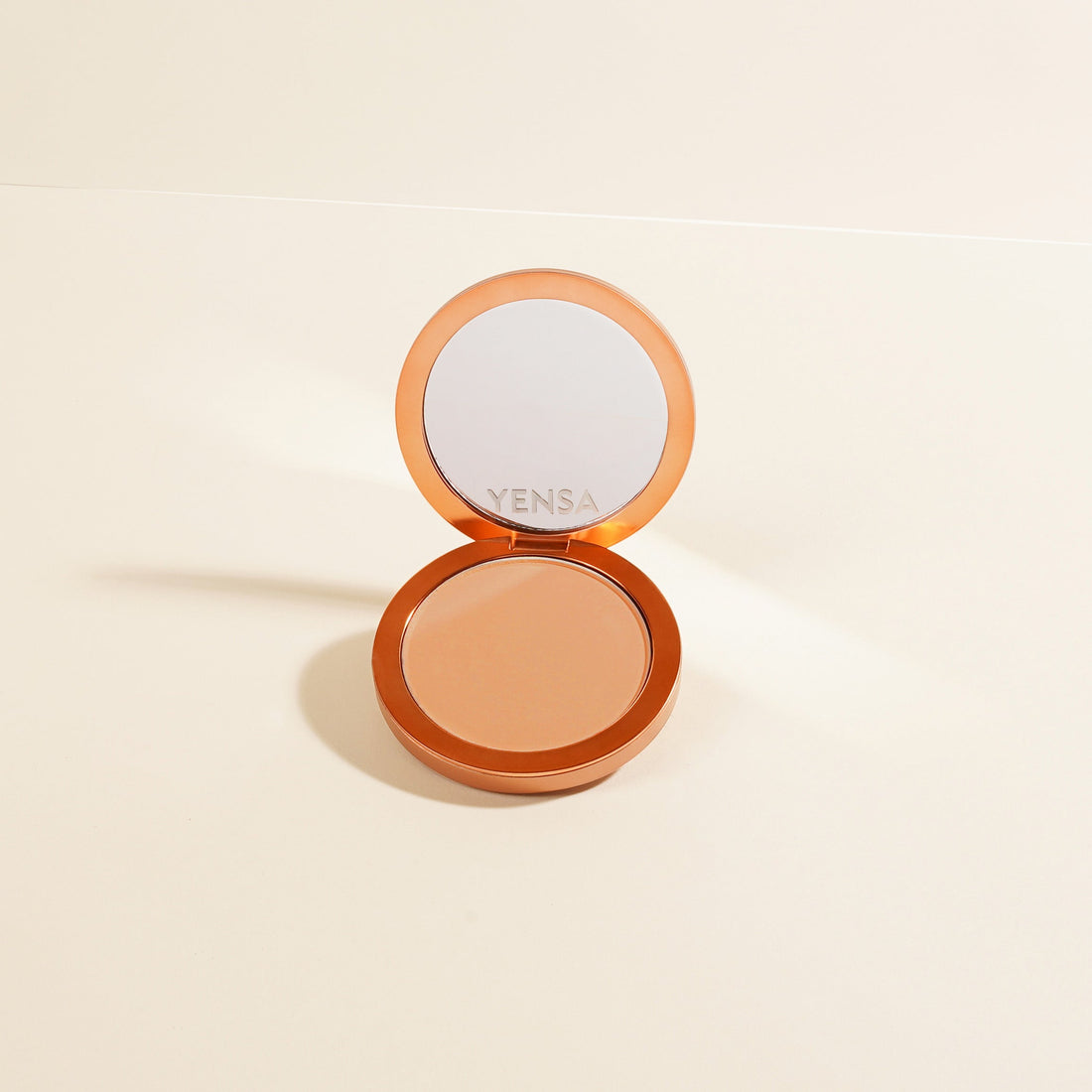 YENSA Super Serum Silk Matte Powder Foundation in compact, with smooth pressed powder finish and natural skin tone.