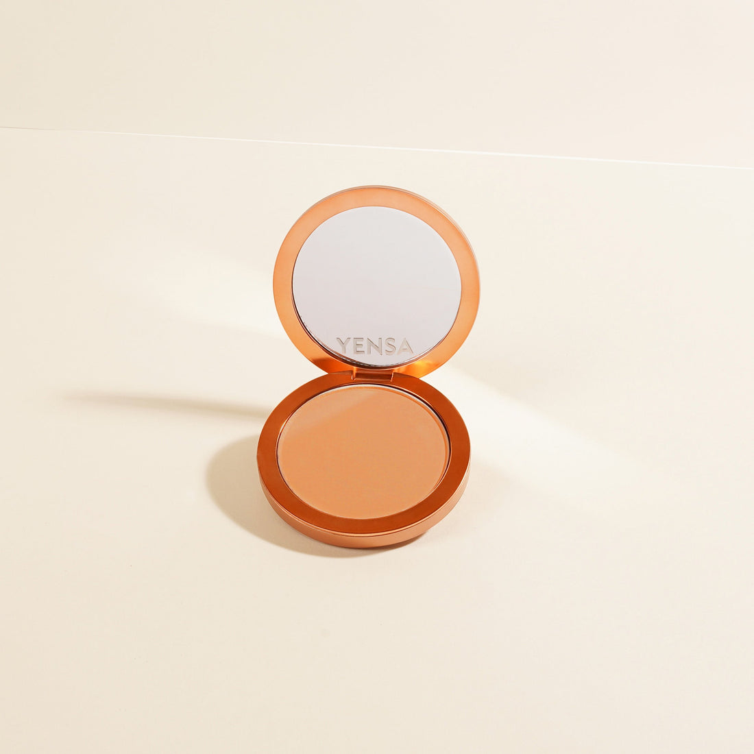 YENSA Super Serum Silk Matte Powder Foundation in a pressed powder compact, showcasing smooth, lightweight coverage.