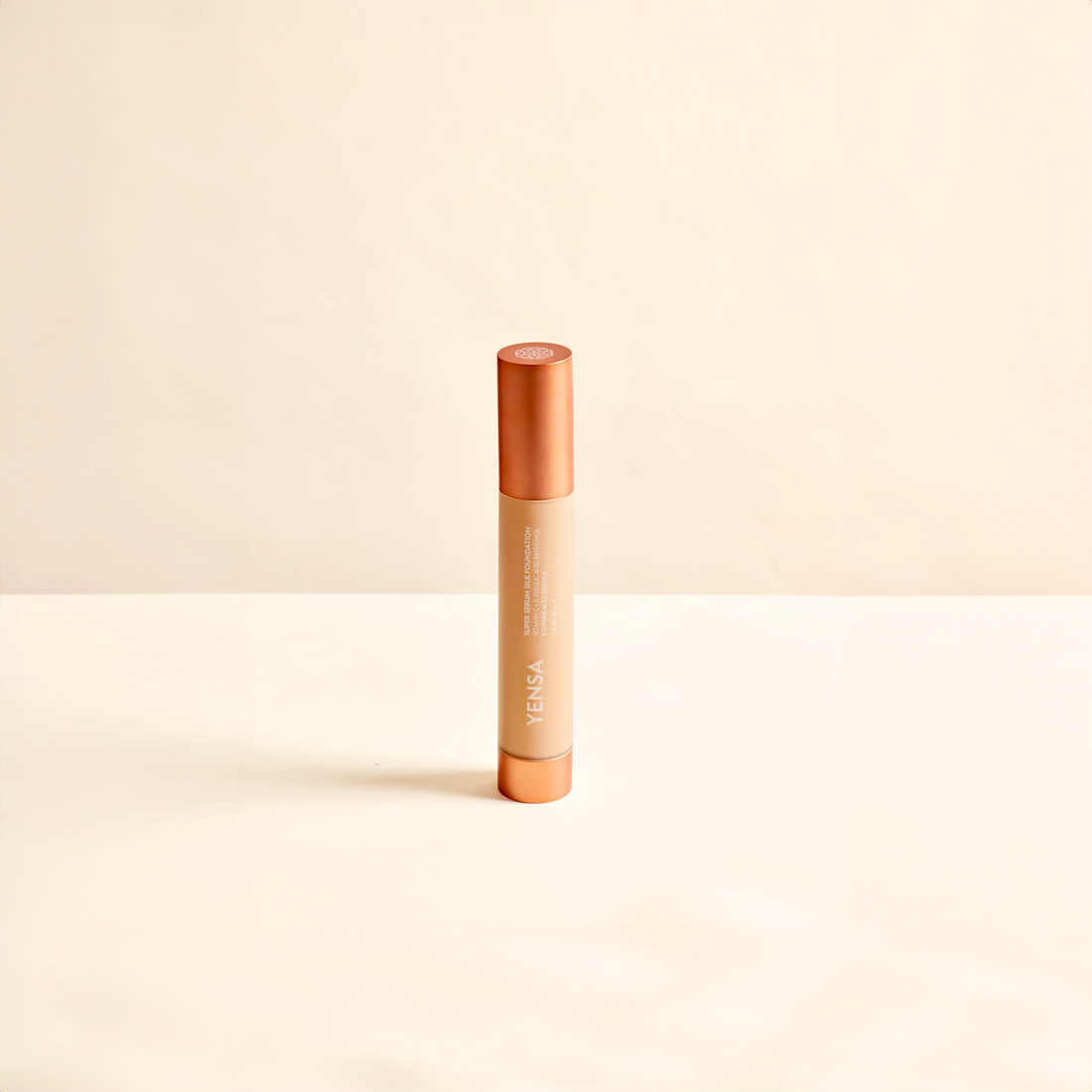 YENSA Super Serum Silk Foundation in medium shade, showcasing a smooth, natural finish for radiant, hydrated skin.