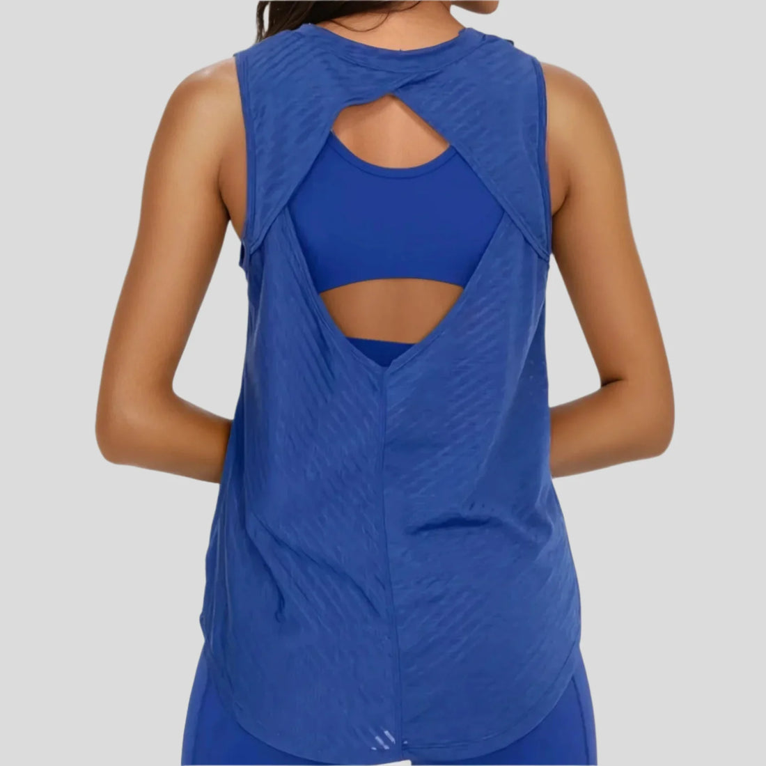 Blue sheer striped mesh active tank top with cut-out back, from Fitkitty Culture athleisure and yoga wear collection.