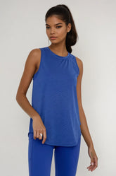 Blue sheer striped mesh active tank top with cut-out back from Fitkitty Culture athleisure wear.