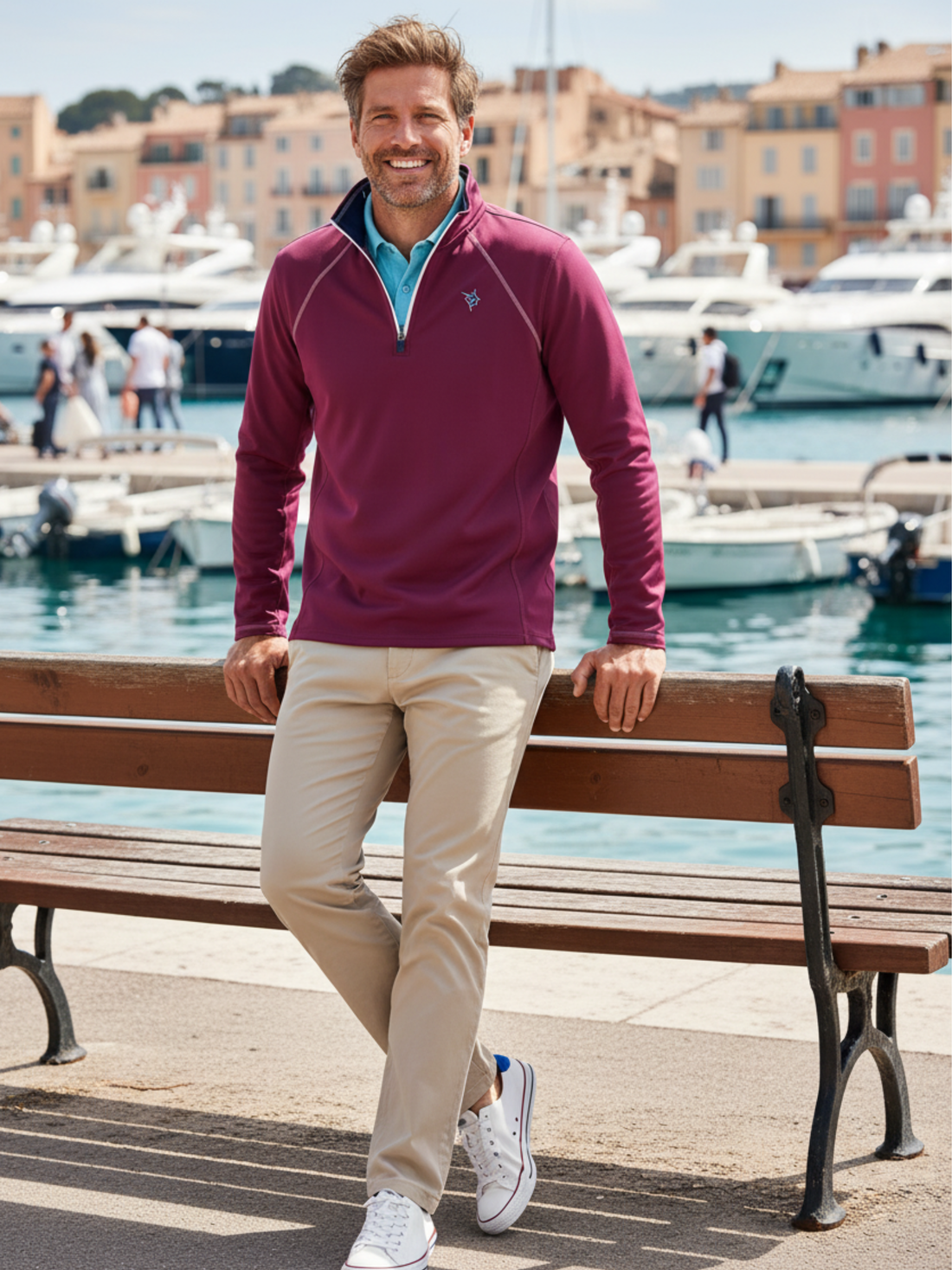 White Water Life New Harbor plum quarter zip hoodie laid on a bench, showcasing its casual, effortless comfort design.