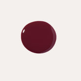 YENSA Luxe Lip Nourishing Oil with hyaluronic and vitamin E, featuring a sleek lip oil applicator and mauve packaging.
