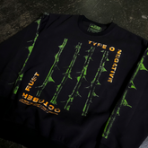 Close-up of black October Rust crewneck sweatshirt by Any Means Necessary Clothing showing fabric and neckline details.