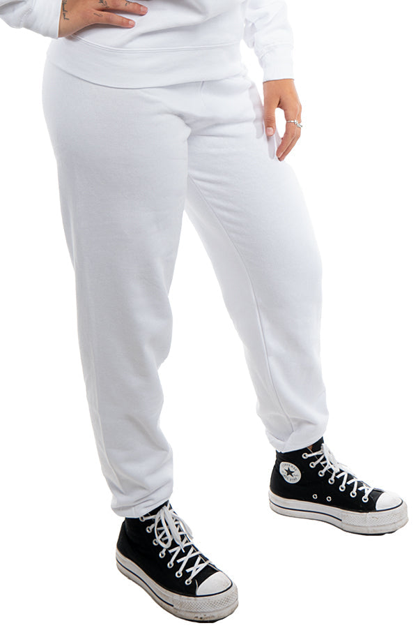 White fleece jogger pants by SpectraUSA, comfortable and casual with a relaxed fit, shown on a model.