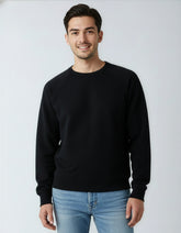 Black fleece crew neck sweatshirt for men by SpectraUSA, shown on a model, highlighting comfortable fit and soft fabric.