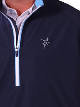 White Water Life Palm Beach waterproof quarter zip logo close-up showing the PB logo on the fabric.