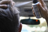 Dry shampoo by Bravo Sierra showing a sleek white bottle with a pump, designed for quick refresh and styling.