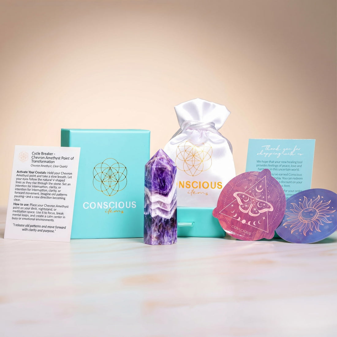 Chevron Amethyst point of transformation in packaging, used as a home decoration by Conscious Items, showcasing natural stone details.
