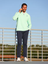 White Water Life Seaport Pants, casual pants with a relaxed fit, shown in a neutral color on a hanger.