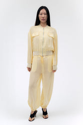 Findmenowthelabel Zora voile pant in butter, light flowing pants with a relaxed fit and soft fabric, displayed on a model.