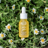 Pretty farm girl Plum Glow face serum with 100% pure plum oil, showcasing a sleek bottle and natural ingredients for radiant skin.