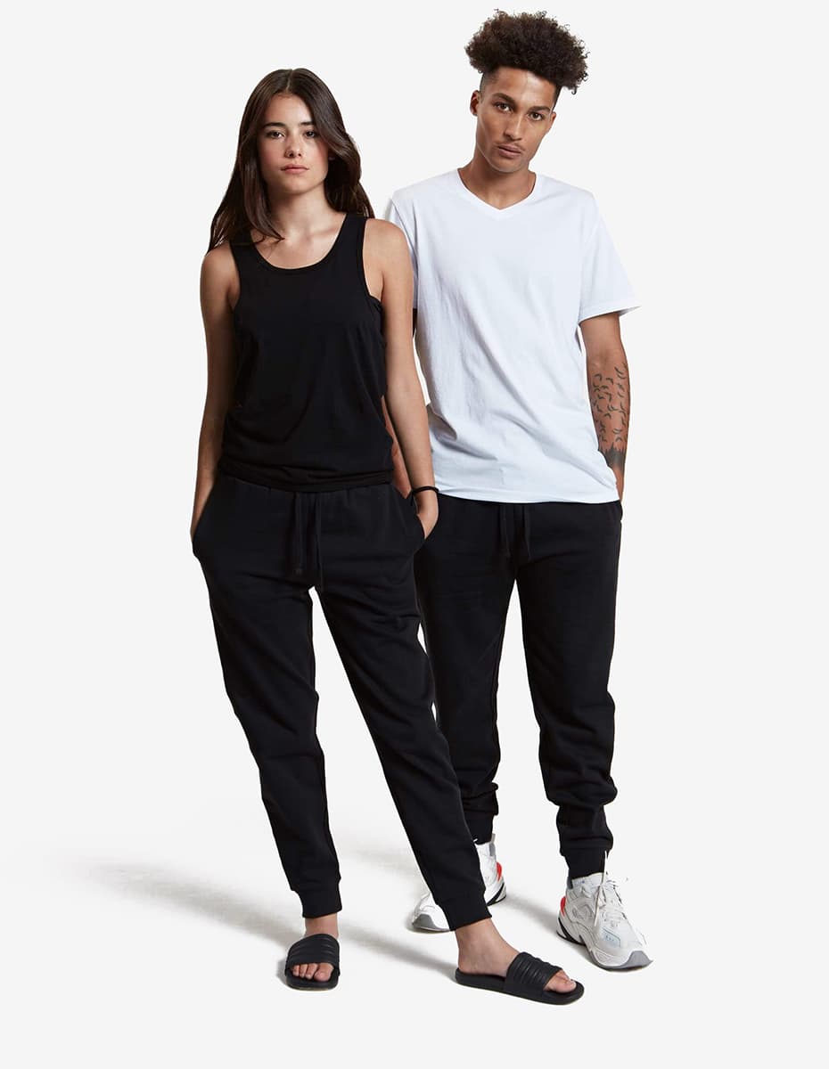 Black fleece unisex jogger sweatpants from SpectraUSA, midweight fleece fabric, relaxed fit, shown in studio setting.