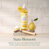 Puracy Yuzu dish soap bottle with label, showing lemon and yuzu citrus fruits, designed for cleaning dishes and kitchenware.