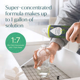 Puracy multi-surface cleaner bottle with spray nozzle, designed for cleaning various surfaces in the home.