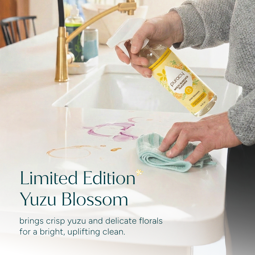 Puracy Everyday Multi-Surface Cleaner in a spray bottle, ready for cleaning various surfaces around the home.