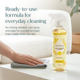 Puracy multi-surface cleaner spray bottle with a white label and blue accents, suitable for cleaning various household surfaces.