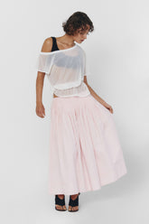 Findmenowthelabel UIARA skirt in baby pink, soft fabric, high-waisted design, and stylish fit perfect for casual or dressy looks.