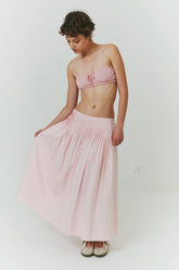 Findmenowthelabel UIARA pink skirt, lightweight baby pink fabric, stylish A-line design, perfect for casual or dressy wear.
