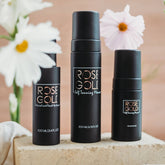 Rose Gold Sunless Face & Body Self Tanning Bundle with various tanning products for a complete glow collection.
