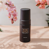 Travel size Rose Gold Sunless self tanning mousse bottle, compact self tanner for a natural bronze glow on the go.