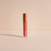 YENSA Luxe Lip Nourishing Oil with hyaluronic acid and vitamin E, featuring a glossy red lip and a sleek lip oil bottle.