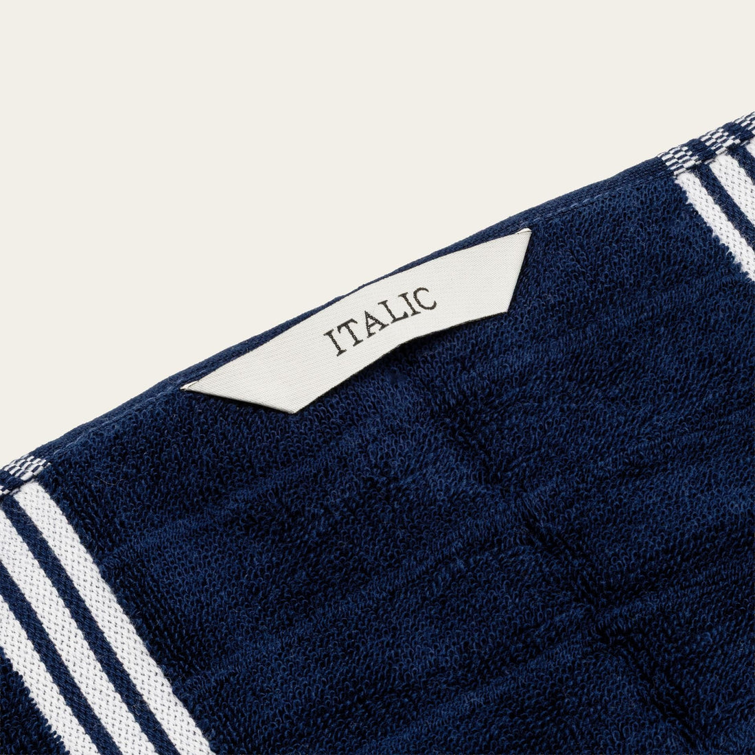 Soft Nautilus Australian Cotton Bath Towel by Italic, shown folded on a bathroom countertop, highlighting plush texture and high-quality fabric.