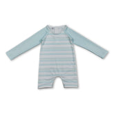 Baby boy summer swimsuit with long sleeves and stripe pattern by Mini Rodeo, designed for sun protection and comfort.