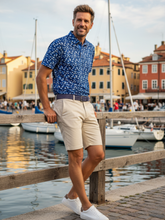 White Water Life Scales Polo shirt in tan, featuring a classic polo design with a collar and short sleeves.