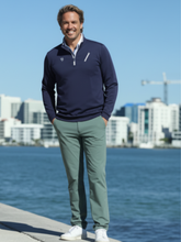 Green Seaport Pants by White Water Life featuring a relaxed fit and ocean-inspired design.