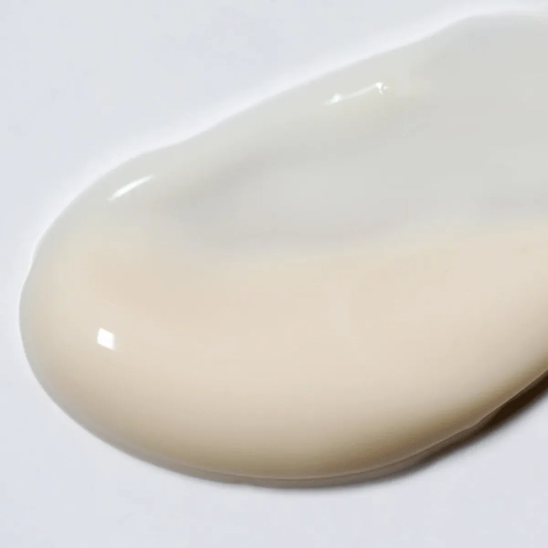 Swatch of Solawave Light Therapy Boosting Eye Cream in a small jar, showcasing the creamy skincare topicals formulation.