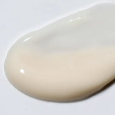 Swatch of Solawave Light Therapy Boosting Eye Cream in a small jar, showcasing the creamy skincare topicals formulation.