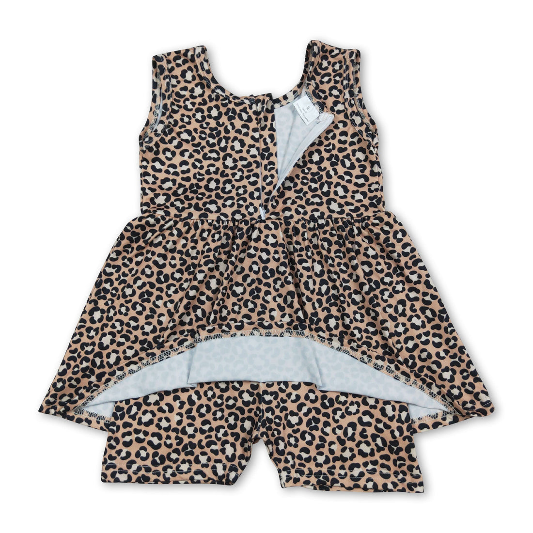 Young girl wearing sleeveless leopard print summer jumpsuit by Mini Rodeo, casual one-piece outfit for girls.