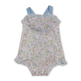 Mini Rodeo floral baby girl summer romper with lace straps, ruffle details, and colorful floral pattern in a bubble style.