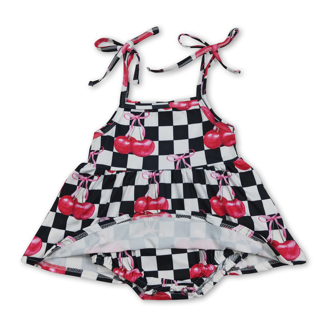 Black plaid cherry bow girl romper by Mini Rodeo, sleeveless summer bubble with cute bow detail for baby girls.