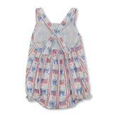 Mini Rodeo girl bubbles romper with straps and flag bow for baby girls, perfect for 4th of July celebrations.