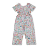 Pink floral girl jumpsuit with short sleeves and pockets by Mini Rodeo, perfect for kids girls.