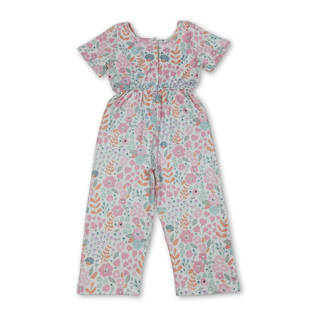 Pink floral girl jumpsuit with short sleeves and pockets by Mini Rodeo, perfect for kids and girls.