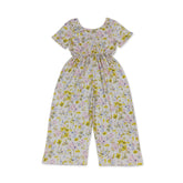 Pink and yellow floral girl jumpsuit with short sleeves, made by Mini Rodeo, perfect for kids&