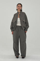 Charcoal SABLE pants by findmenowthelabel, featuring a tailored fit and classic style, shown on a model.