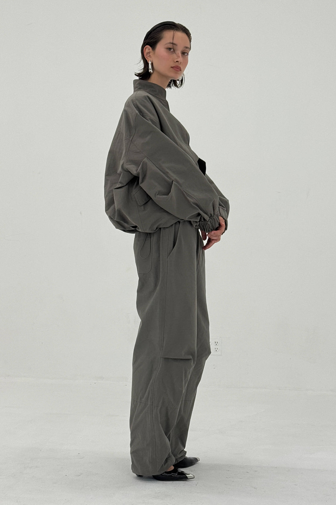 Charcoal Sable pants by findmenowthelabel, shown in a stylish, tailored fit with side pockets and a modern design.