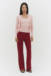 Findmenowthelabel ribbed knit cardigan in powder pink, showing the soft textured fabric and classic fit.