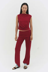 Findmenowthelabel DASOM tank top in raspberry, featuring stylish sleeveless design and soft fabric, shown on a model.